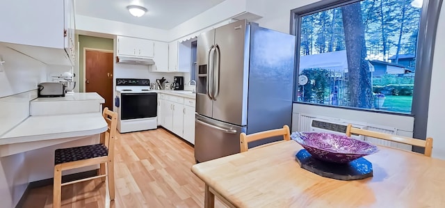 kitchen with stainless steel refrigerator with ice dispenser, white electric range, light hardwood / wood-style flooring, and white cabinets