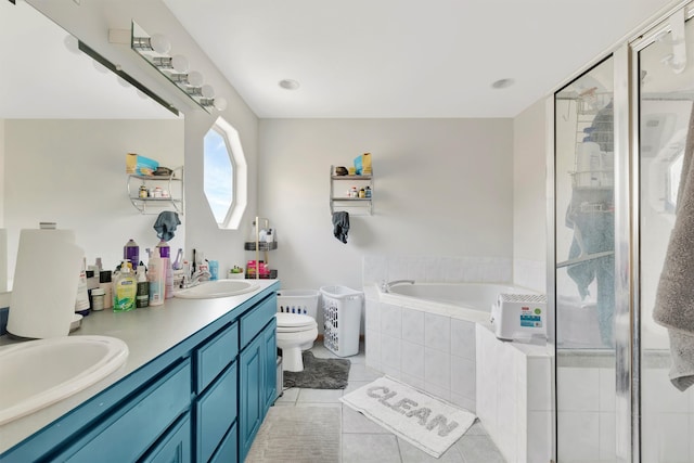 full bathroom with tile patterned floors, independent shower and bath, toilet, and double sink vanity