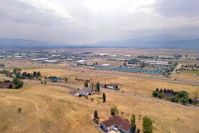 aerial view with a mountain view and a rural view