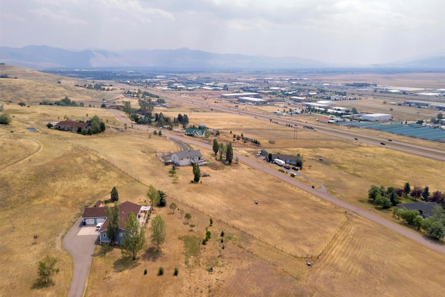 aerial view with a mountain view and a rural view