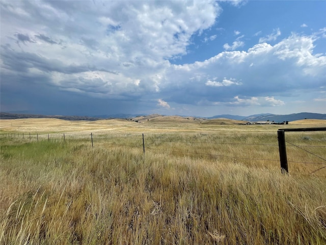 exterior space with a rural view