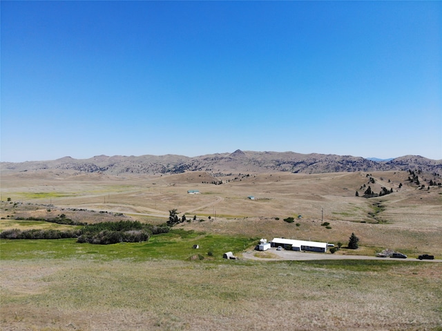 property view of mountains with a rural view