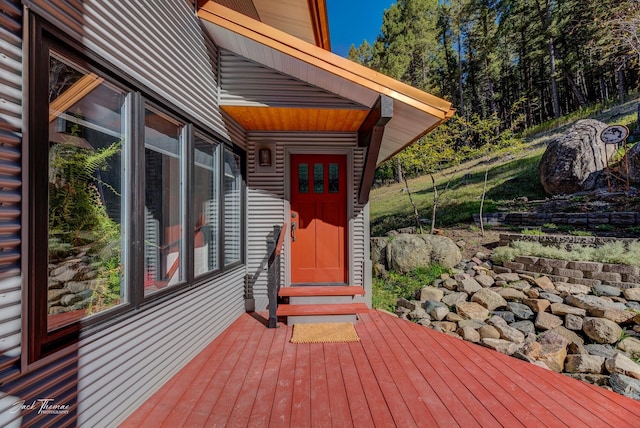 entrance to property featuring a deck