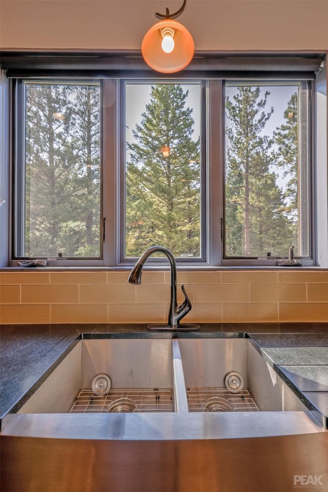 interior details with backsplash and sink