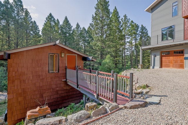 view of property exterior with a garage