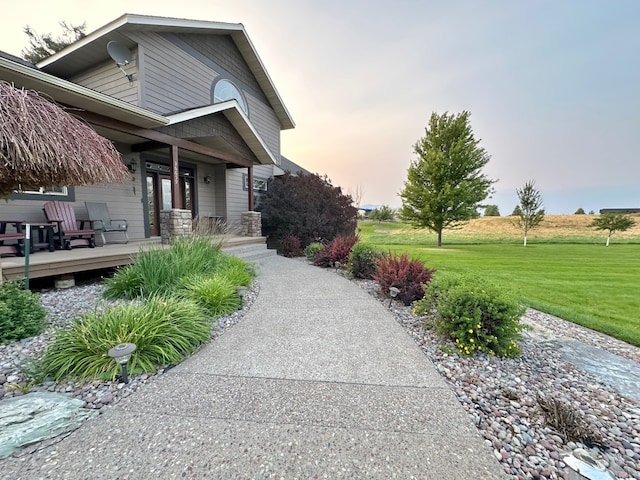 exterior space with a yard and a porch