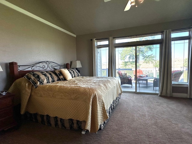 carpeted bedroom with access to outside, multiple windows, ceiling fan, and vaulted ceiling