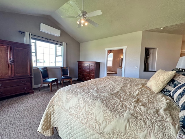 bedroom featuring carpet flooring, ensuite bathroom, vaulted ceiling, and ceiling fan