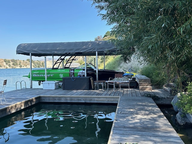 view of dock with a water view