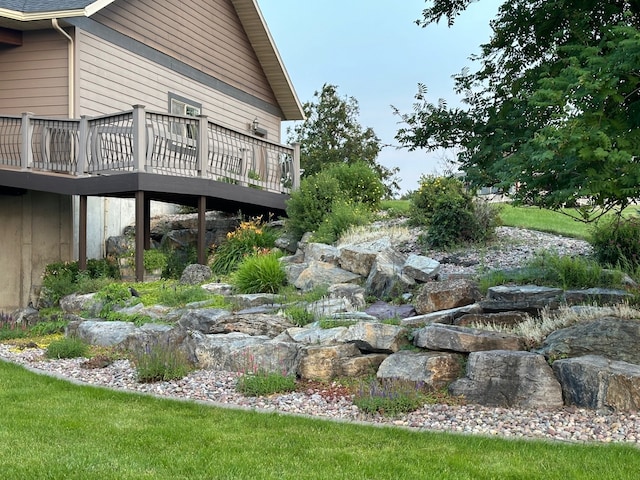 view of yard featuring a wooden deck