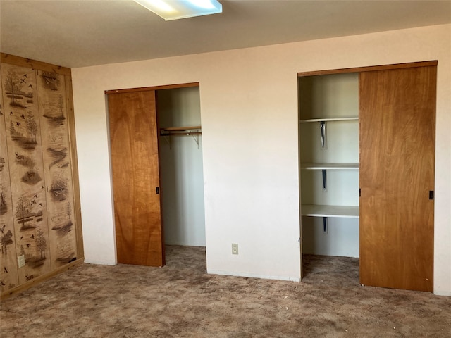 unfurnished bedroom featuring carpet flooring