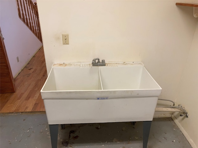 miscellaneous room featuring sink and hardwood / wood-style floors