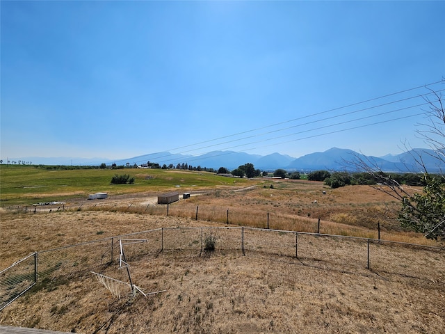 property view of mountains featuring a rural view