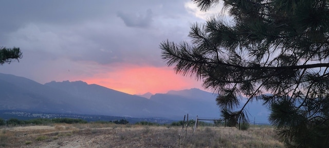 view of mountain feature with a rural view