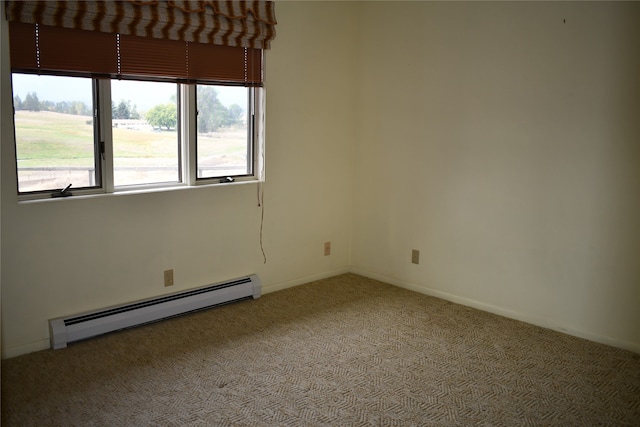 unfurnished room featuring baseboard heating and carpet flooring