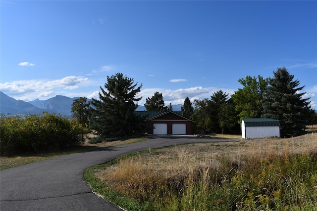 exterior space featuring a mountain view