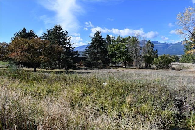 view of mountain feature with a rural view