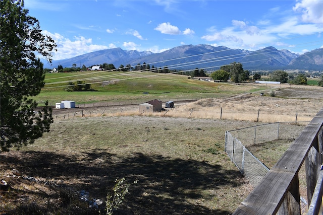 mountain view featuring a rural view