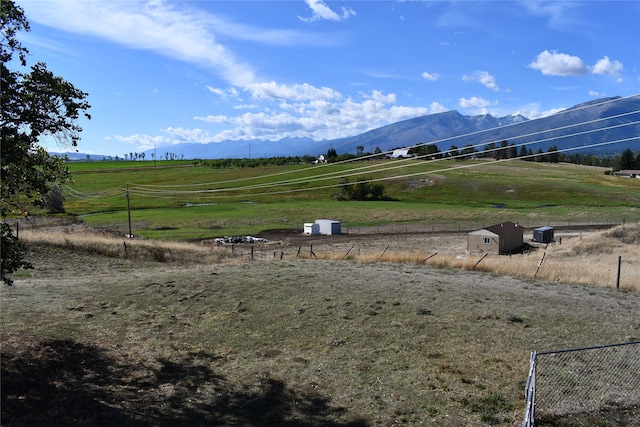 mountain view featuring a rural view