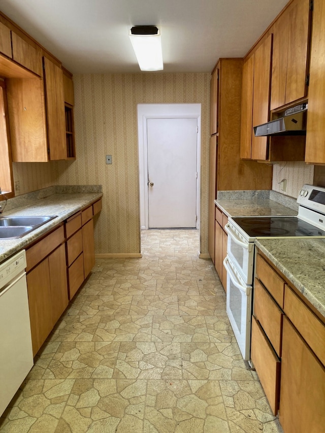 kitchen with white appliances and sink