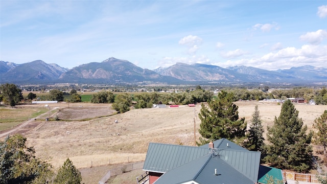 view of mountain feature with a rural view