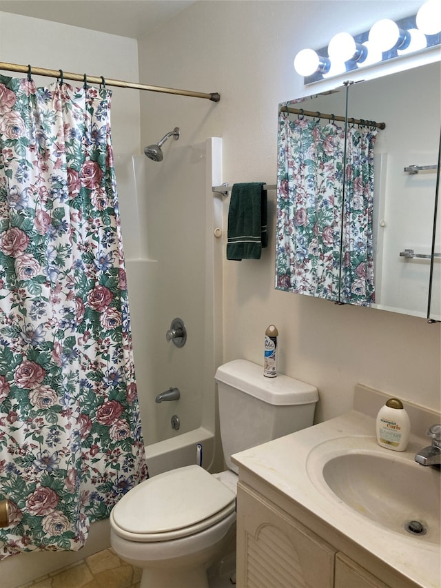 full bathroom with vanity, toilet, and shower / bath combo with shower curtain