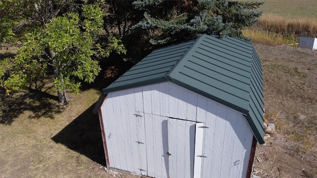 entry to storm shelter with a storage shed