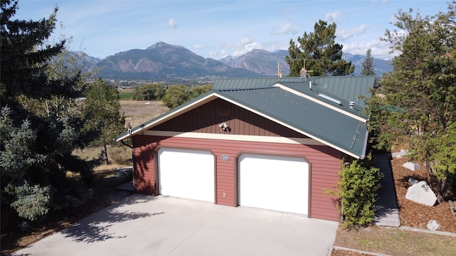 garage featuring a mountain view