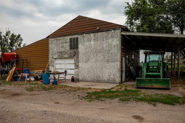 view of outbuilding with a playground