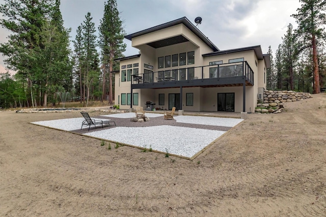 back of property with a patio area