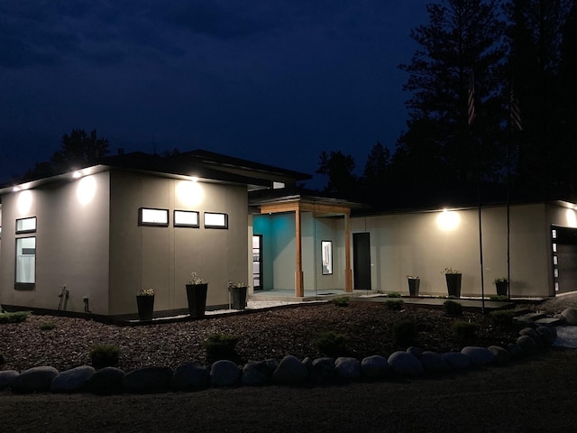 view of front of property featuring a patio