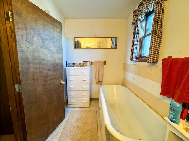 bathroom with a washtub