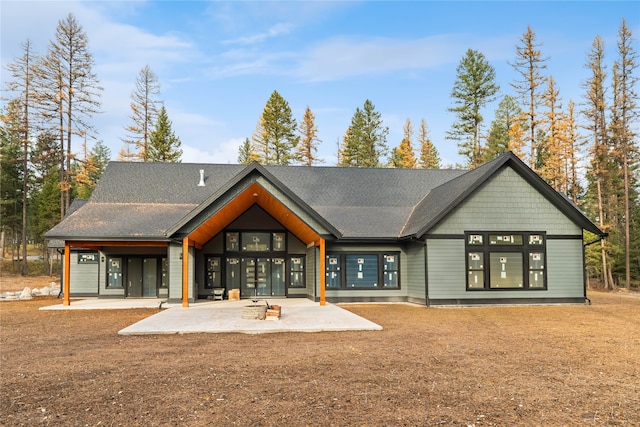 back of property featuring a patio area