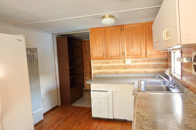 kitchen featuring sink and hardwood / wood-style floors