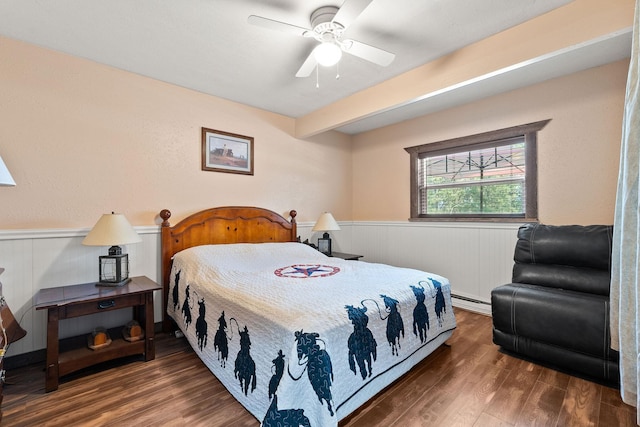 635 Lore Lake Rd, Kalispell, MT 59901 - bedroom with ceiling fan, wainscoting, and wood finished floors
