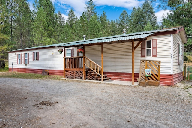 635 Lore Lake Rd, Kalispell, MT 59901 - manufactured / mobile home featuring metal roof