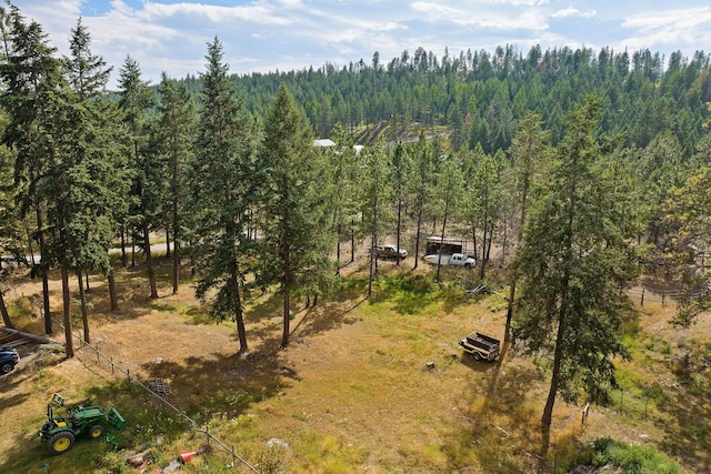 635 Lore Lake Rd, Kalispell, MT 59901 - aerial view featuring a forest view