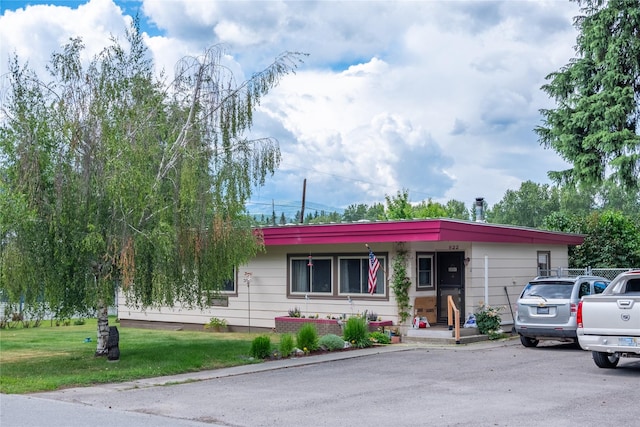 822 W Balsam St, Libby, MT 59923 - ranch-style house with a front yard