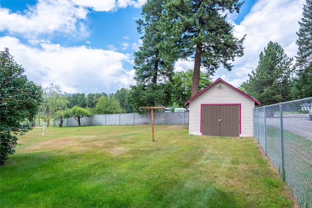 view of yard with a storage shed