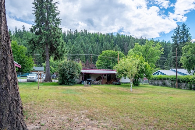 view of yard with a carport