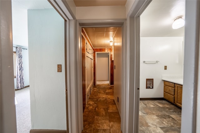 hallway featuring heating unit