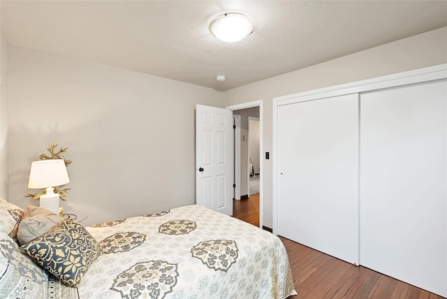 908 10th St, Whitefish, MT 59937 - bedroom featuring wood finished floors and a closet