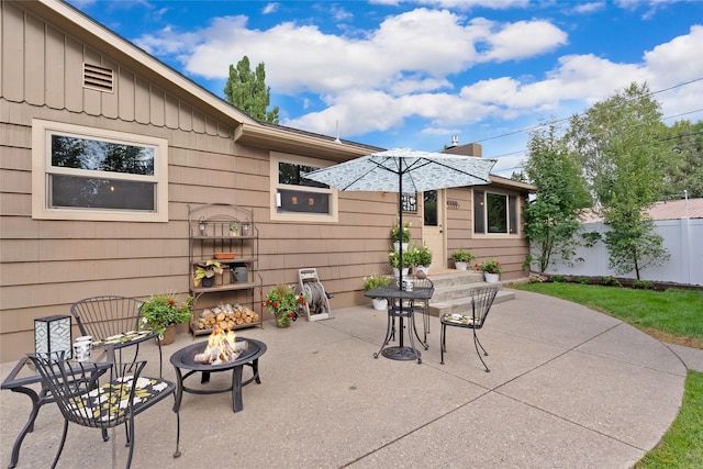 908 10th St, Whitefish, MT 59937 - view of patio featuring an outdoor fire pit and outdoor dining area