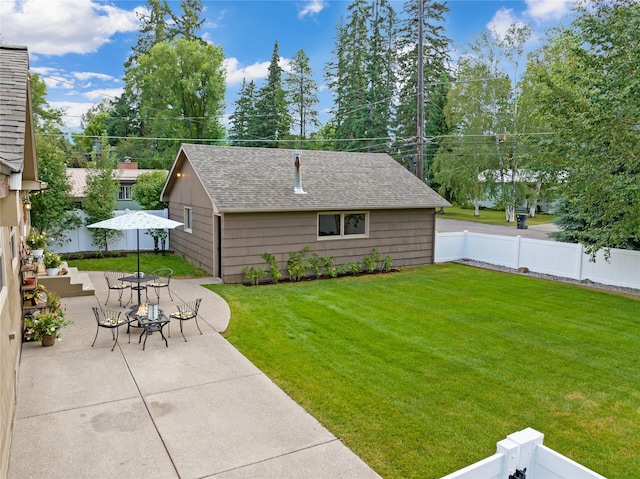 908 10th St, Whitefish, MT 59937 - fenced backyard featuring a patio area