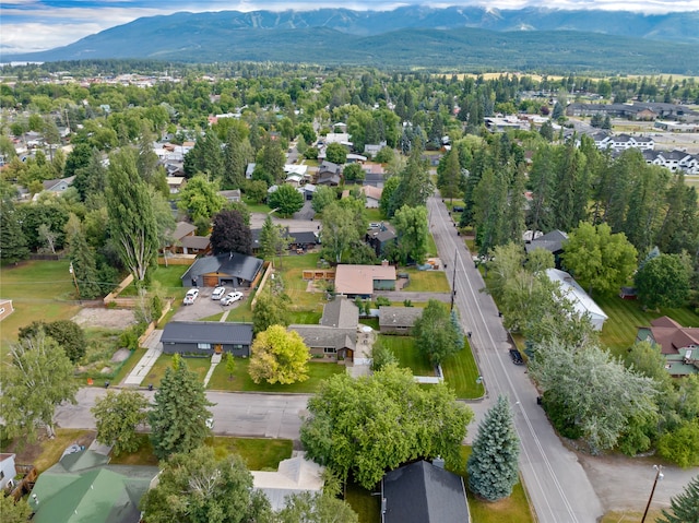 908 10th St, Whitefish, MT 59937 - aerial perspective of suburban area with a mountain backdrop