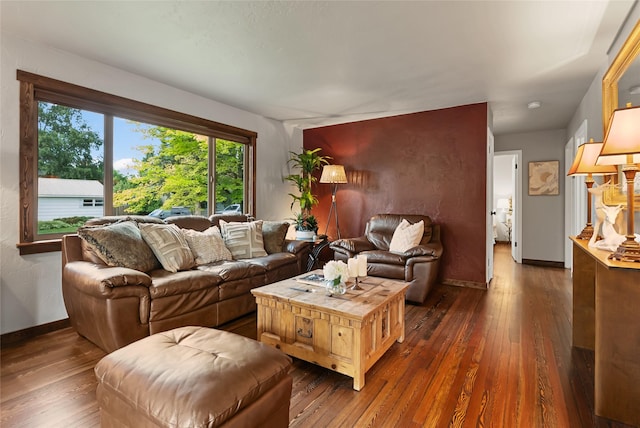 908 10th St, Whitefish, MT 59937 - living area featuring dark wood-style flooring and healthy amount of natural light