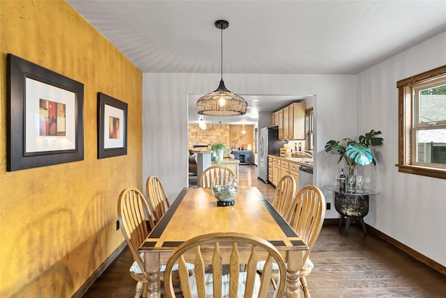 908 10th St, Whitefish, MT 59937 - dining area with light wood-type flooring and baseboards