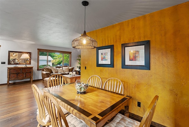 908 10th St, Whitefish, MT 59937 - dining space featuring wood finished floors and baseboards