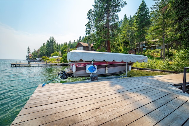 view of dock with a water view