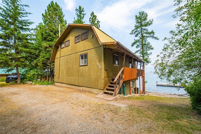 exterior space featuring a water view